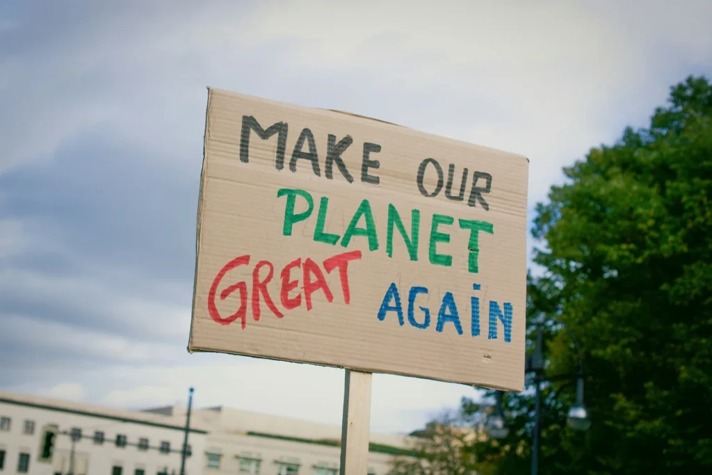 Placard saying "Make our planet great again" for protests.